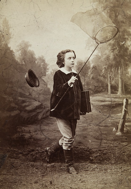 Studio portrait of Paul as butterfly catcher,